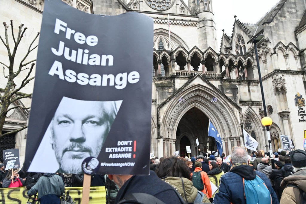 Julian Assange is the World's Iconic Symbol of Free Speech Fights Extradition to US from cell in London